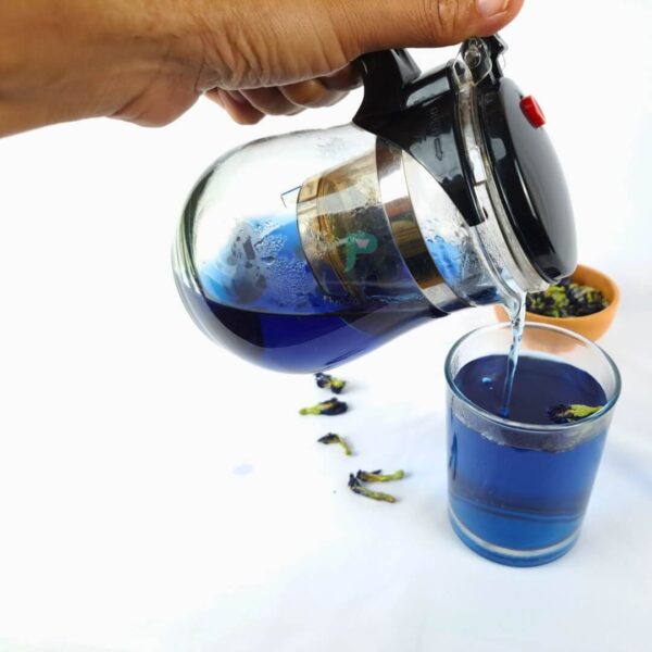 pouring butterfly pea